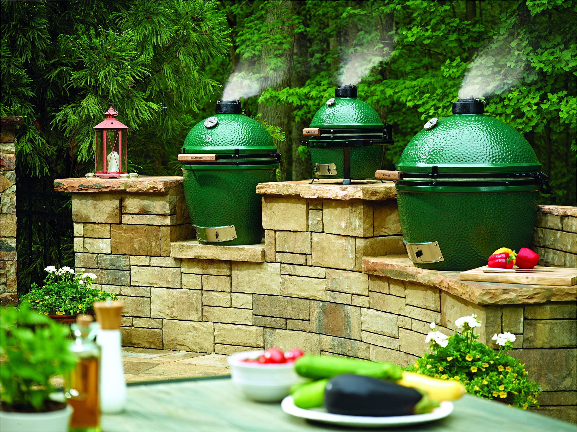 Big Green Egg kamado grills on a patio